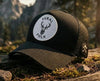 Drop 001: The URBAN STAG 'Wild Roots' Black Trucker