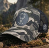 DROP 001: THE WOODLAND STAG 'WILD ROOTS' CAMO TRUCKER
